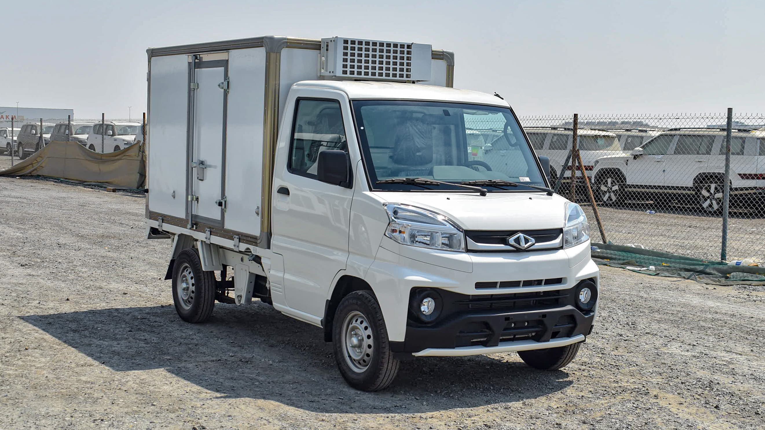 CMC white refrigerated freezer van on commercial lot in Sudan